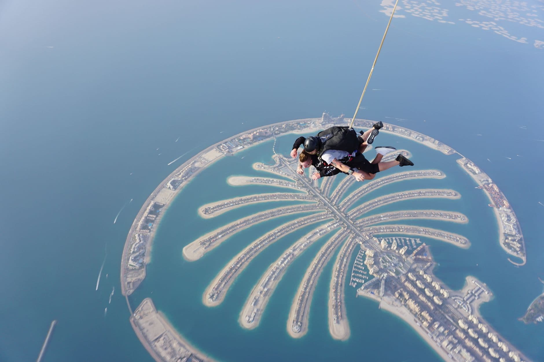 Saut en parachute tandem au-dessus de Palm Jumeirah Dubai avec vue Atlantis et Burj Al Arab skydive prix 2026